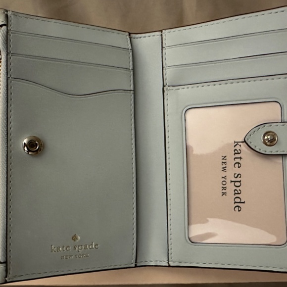 ♠️ Kate Spade Leila Pebbled Leather Small Slim Bifold Wallet Hazy Morning Blue